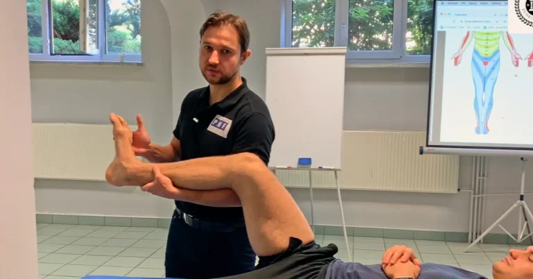 Physiotherapist testing ankle clonus with the patient supine, the hip and knee flexed and the foot held in dorsiflexion